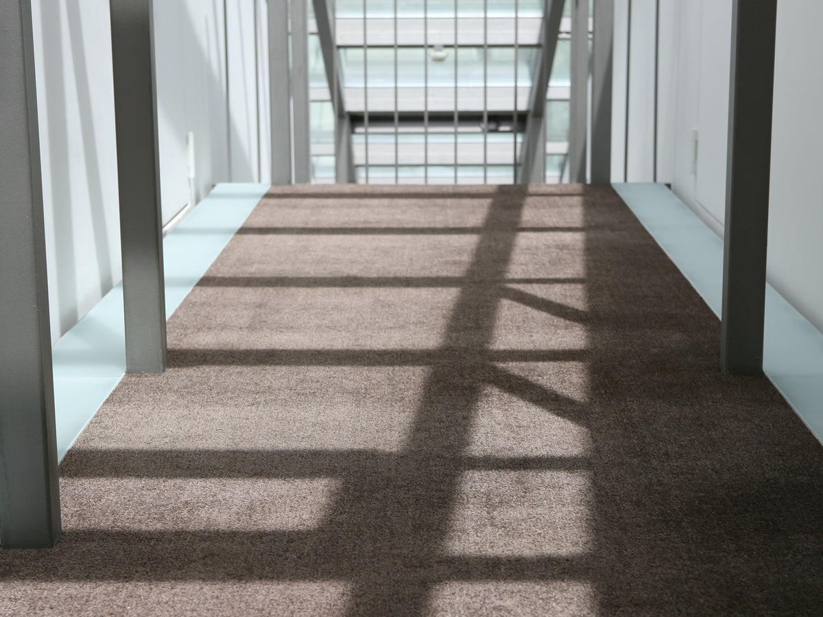 Ruckstuhl Referenzprojekt Zermatt Hotel Omnia – Teppich PORTA in 60081 Anthrazitbraun, Rampe
