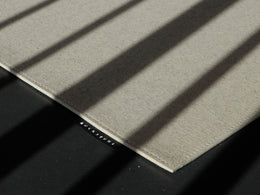 Ruckstuhl Einfassung Steppnaht am Teppich FELTRO COLOR in 40180 – Label