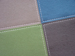 Ruckstuhl Einfassung Steppnaht am Teppich FELTRO COLOR – Vierfarbig
