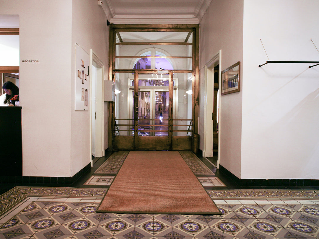 Ruckstuhl PORTA Kokos-Schmutzschleuse in 20124 Natur – Hotel Krafft Ausgang