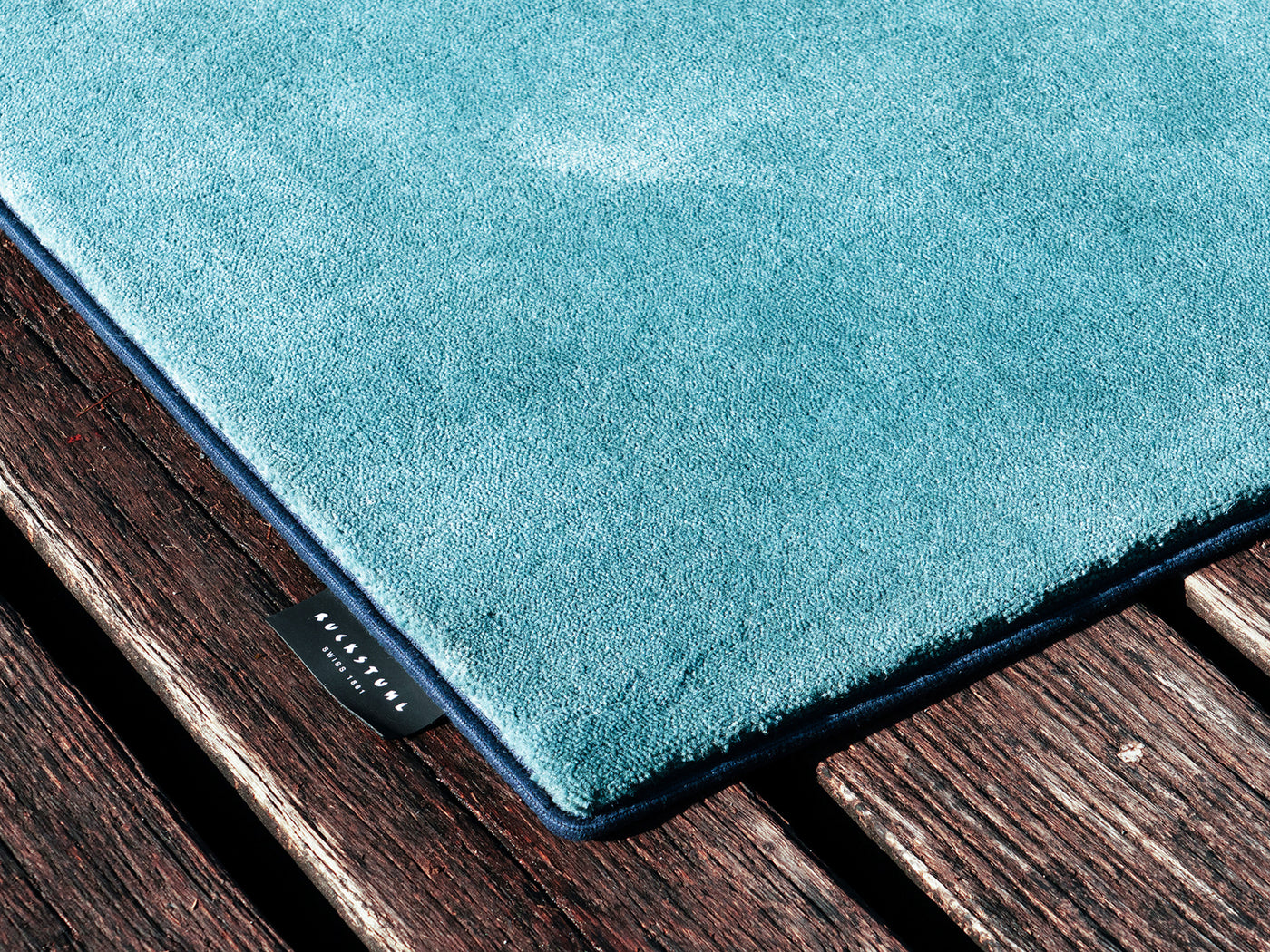 Ruckstuhl Teppich HAMPTON in 30284 Glacier – mit Satina-Einfassung