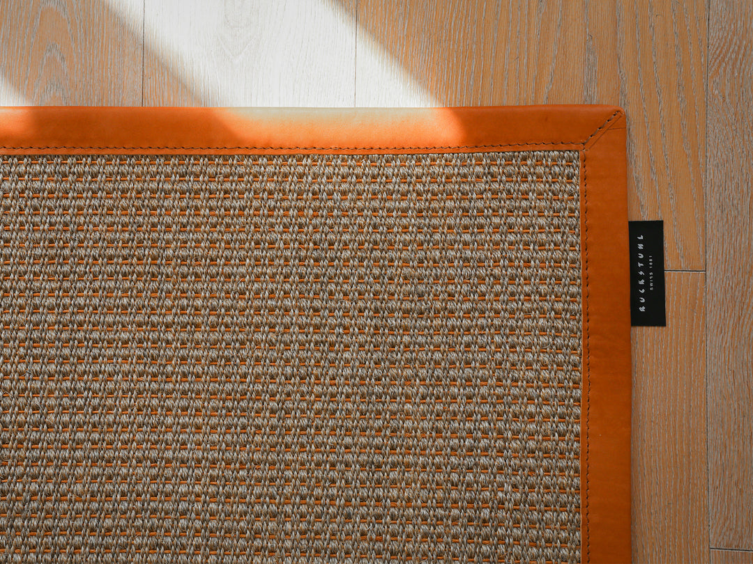 Ruckstuhl Teppich Sisal Flow 10305 lachs Lederband 10215 terracotta DK 3