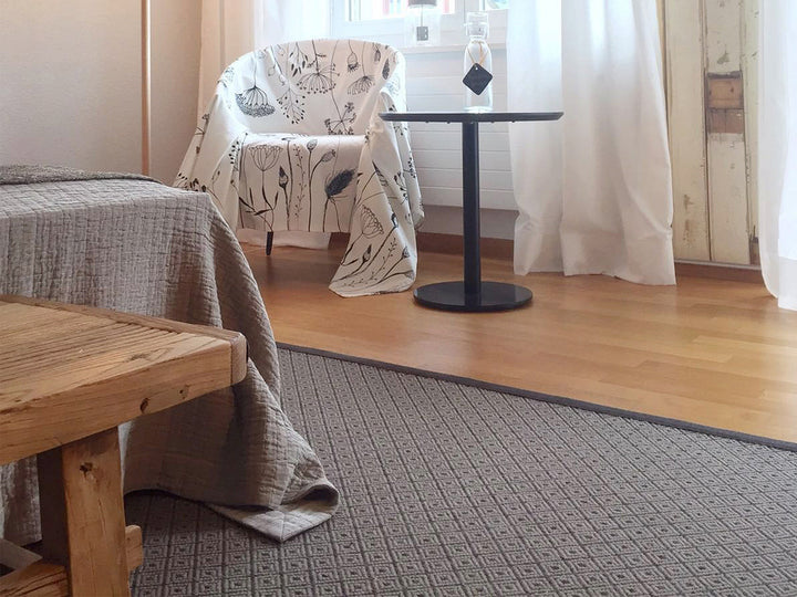 Ruckstuhl Teppich Wolle Rose Diamond 20463 taupe Schlafzimmer