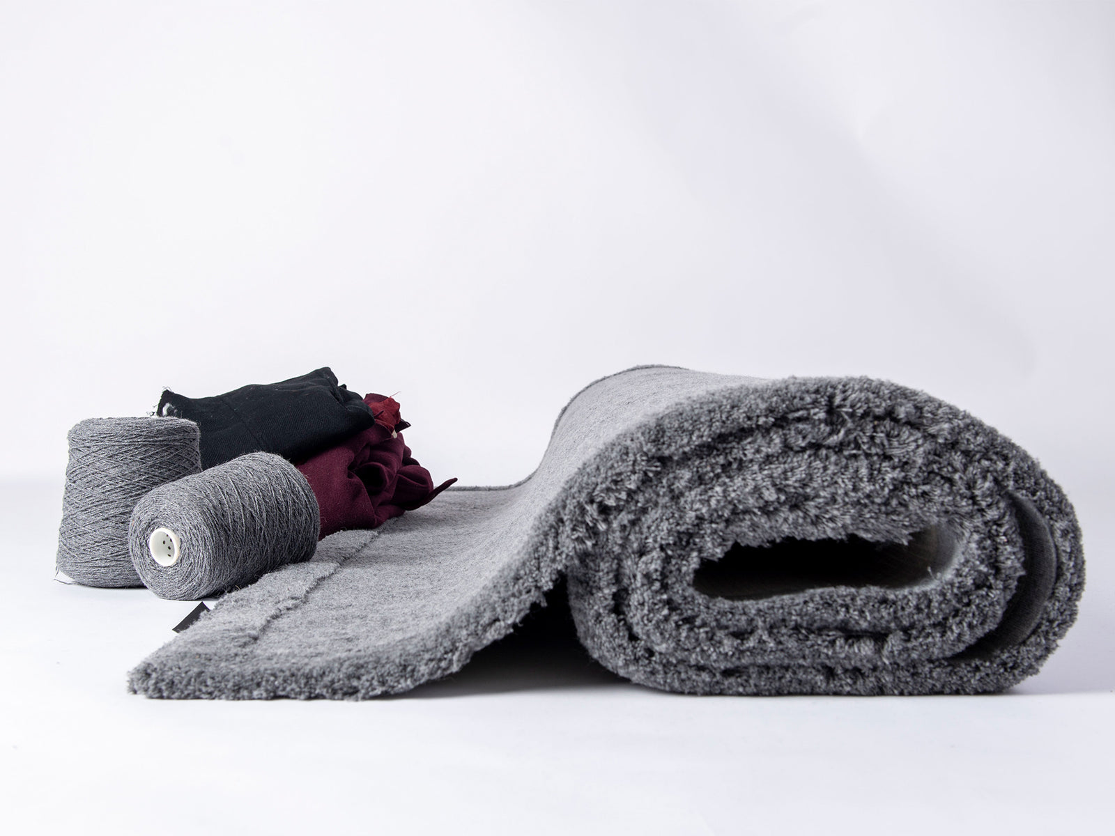 Ruckstuhl Recyclingwollteppich – Forschungsprojekt PHENX von HSLU TEXCIRCLE – Teppichdetail mit Recyclinggarn